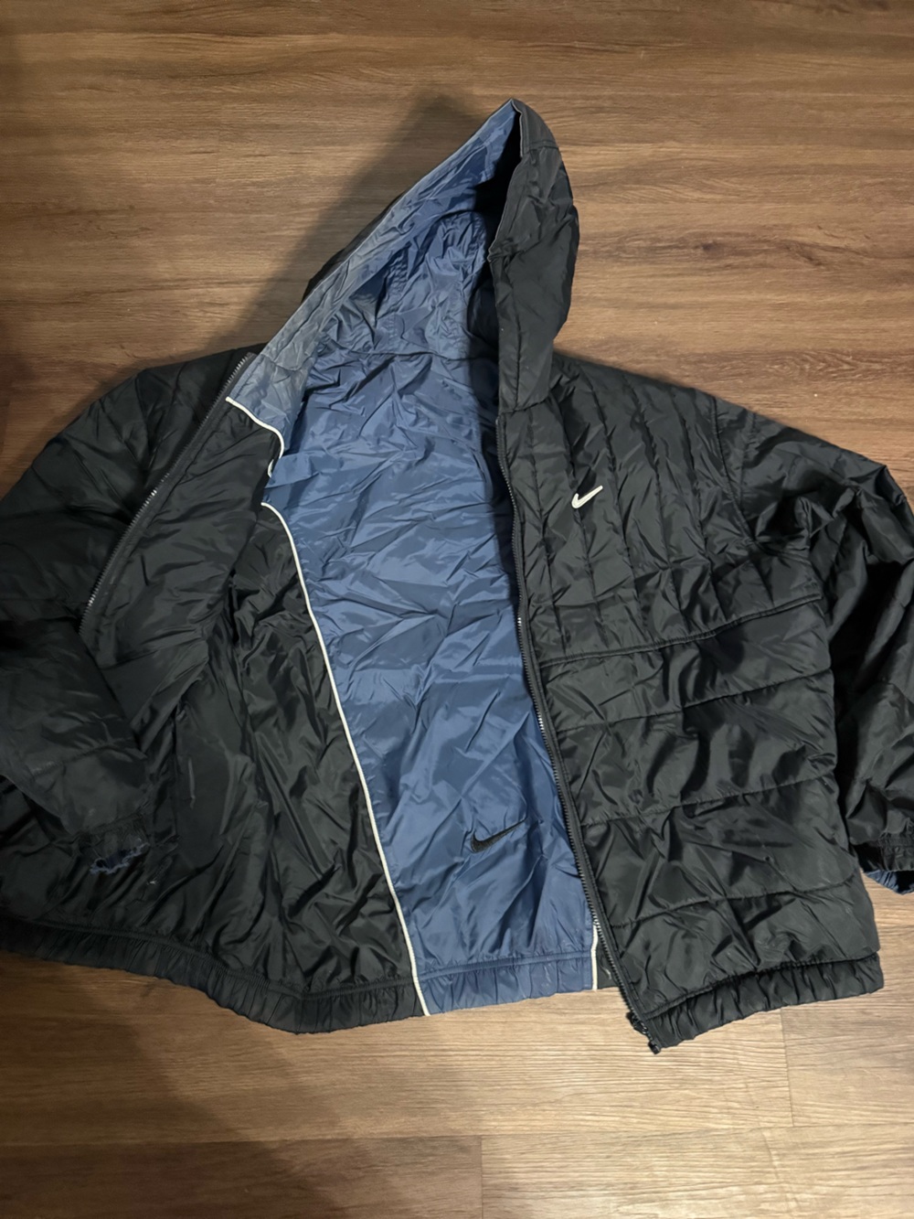 Nike Men's Black Puffer Jacket with Blue Interior
